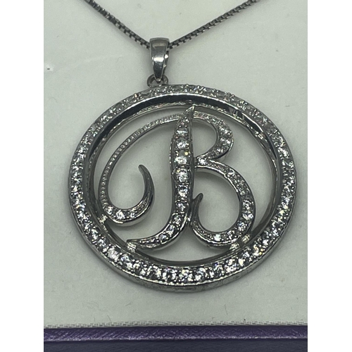 573 - A MARKED 925 SILVER NECKLACE WITH SILVER B PENDANT