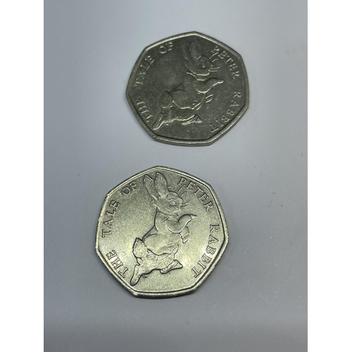 596 - THREE 2017 COLLECTABLE 50 PENCE PIECES TO INCLUDE TWO PETER RABBIT AND ONE JEREMY FISHER