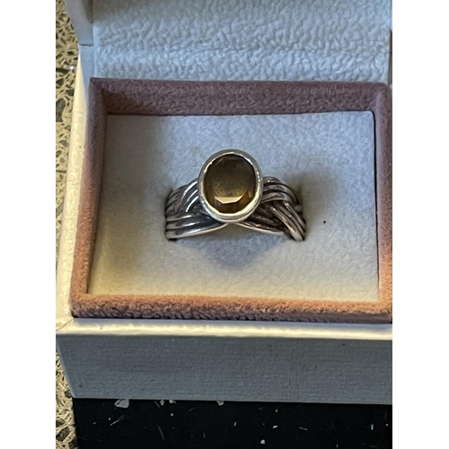 625 - A MARKED SILVER DRESS RING WITH A SMOKEY AMBER COLOURED STONE SIZE O IN A PRESENTATION BOX