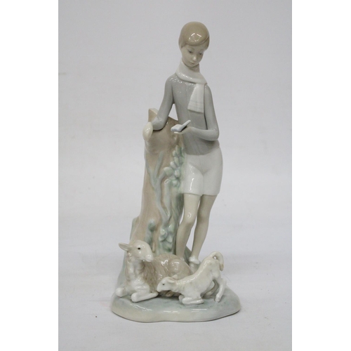 771 - A PORCELAIN LLADRO FIGURE OF A BOY WITH LAMBS