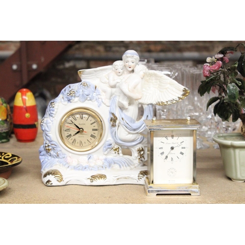 1072 - TWO MANTLE CLOCKS TO INCLUDE A CERAMIC ANGEL WITH CHILDREN, PLUS A CARRIAGE CLOCK