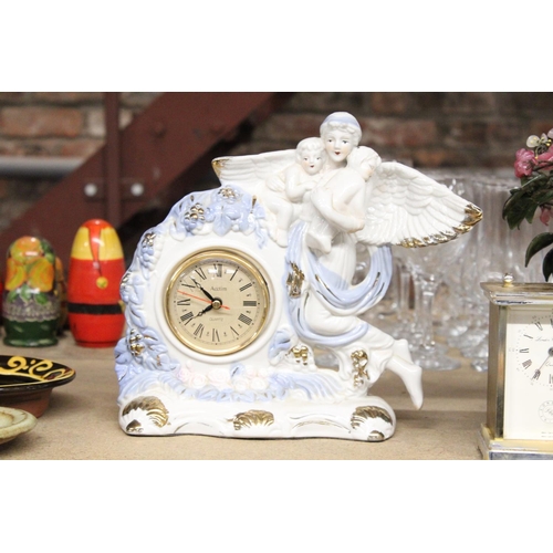 1072 - TWO MANTLE CLOCKS TO INCLUDE A CERAMIC ANGEL WITH CHILDREN, PLUS A CARRIAGE CLOCK