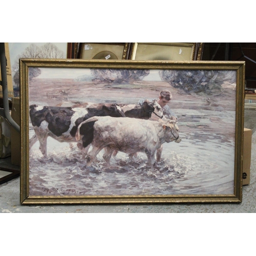 1135 - A FRAMED PRINT OF COWS AND BOY IN RIVER SCENE