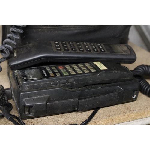 1181 - TWO VINTAGE FIELD PHONES TO INCLUDE A PANASONIC AND PHILIPS WITH A CHARGER IN A BAG