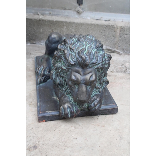 1517 - A PAIR OF TERRACOTTA BRONZE EFFECT LIONS