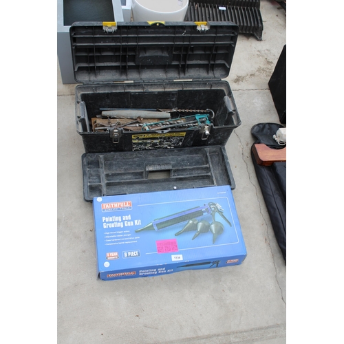 1738 - A PLASTIC TOOL BOX WITH AN ASSORTMENT OF TOOLS TO INCLUDE DRILL BITS, HAMMERS AND A POINTING GUN KIT... 