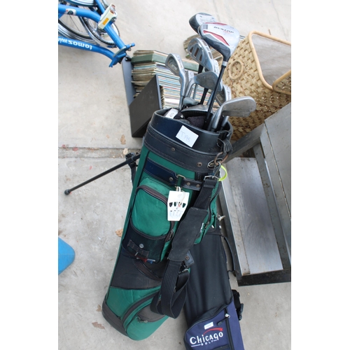 1856 - TWO GOLF BAGS AND AN ASSORTMENT OF GOLF CLUBS