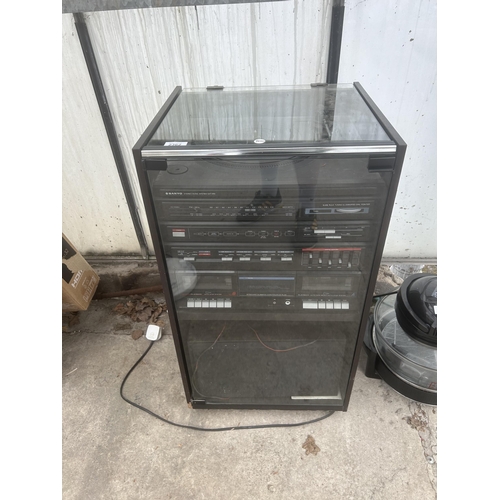 2362 - A CABINET CONTAINING A SANYO STEREO SYSTEM WITH TWO SPEAKERS