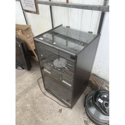 2362 - A CABINET CONTAINING A SANYO STEREO SYSTEM WITH TWO SPEAKERS