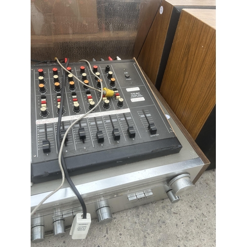 2389 - AN AKAI STEREO SYSTEM WITH MODEL 2A AUDIO MIXER AND A PAIR OF WOODEN CASED SOLAVOX SPEAKERS ETC