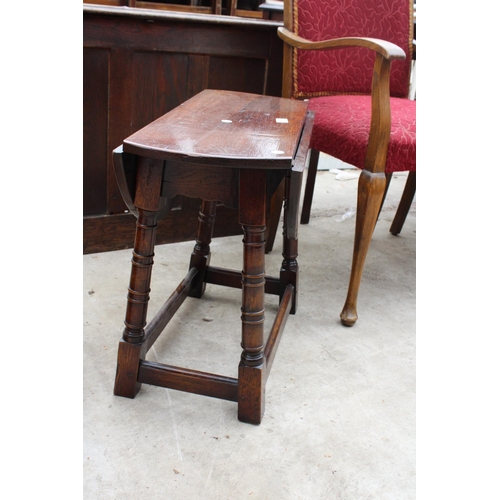 2557 - A MINIATURE OAK DROP-LEAF TABLE ON TURNED LEGS