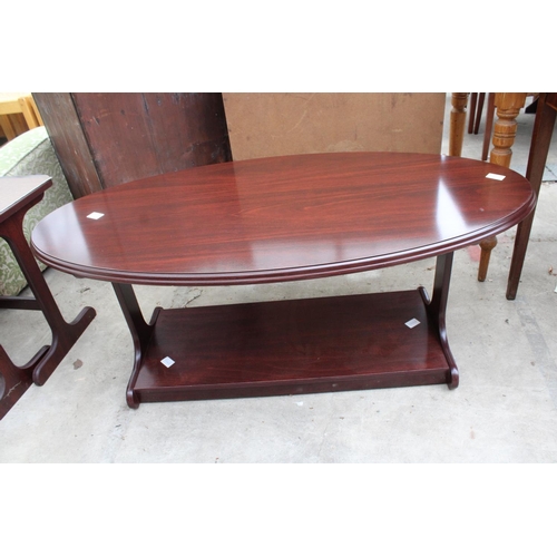 2563 - AN OVAL TWO TIER MAHOGANY COFFEE TABLE