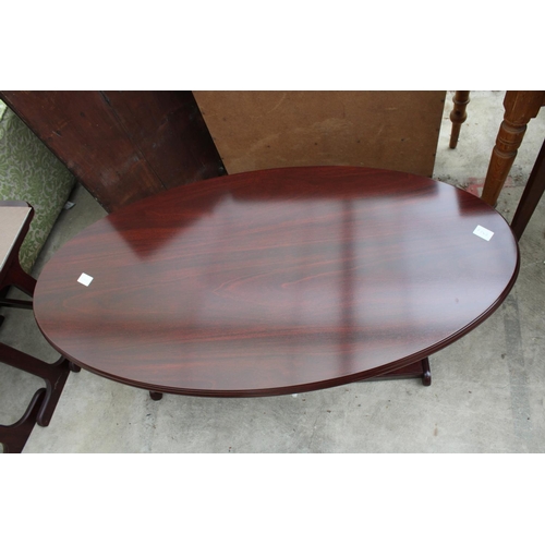 2563 - AN OVAL TWO TIER MAHOGANY COFFEE TABLE