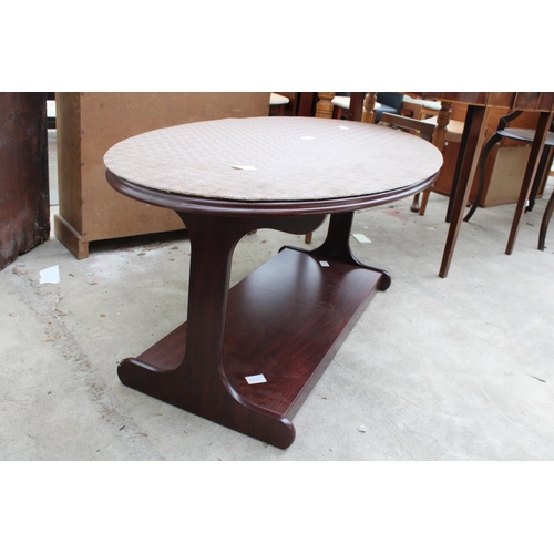 2563 - AN OVAL TWO TIER MAHOGANY COFFEE TABLE