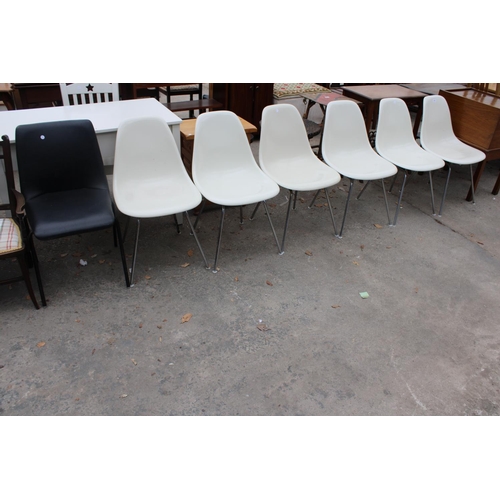 2572 - A SET OF SIX CHARLES EAMES FIBREGLASS CHAIRS ON CHROME LEGS BY VITRA AND AN R.E.L. SINGLE CHAIR