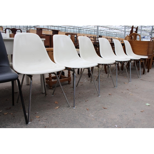 2572 - A SET OF SIX CHARLES EAMES FIBREGLASS CHAIRS ON CHROME LEGS BY VITRA AND AN R.E.L. SINGLE CHAIR