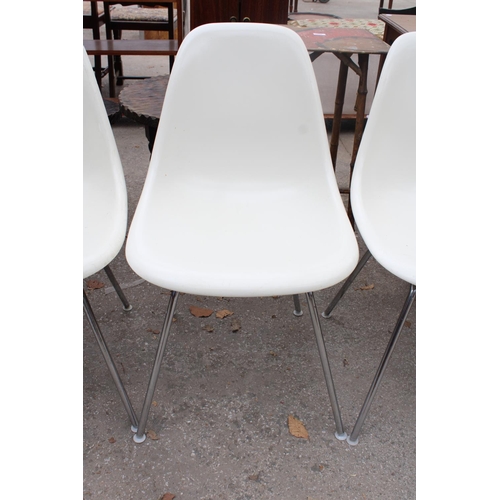 2572 - A SET OF SIX CHARLES EAMES FIBREGLASS CHAIRS ON CHROME LEGS BY VITRA AND AN R.E.L. SINGLE CHAIR