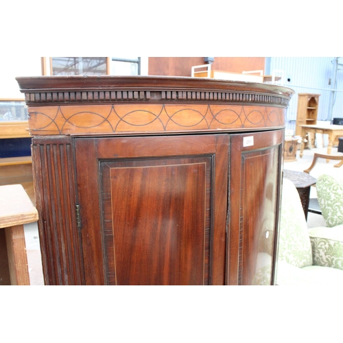 2590 - A GEORGE III MAHOGANY INLAID AND CROSSBANDED TWO DOOR CORNER CUPBOARD, 32