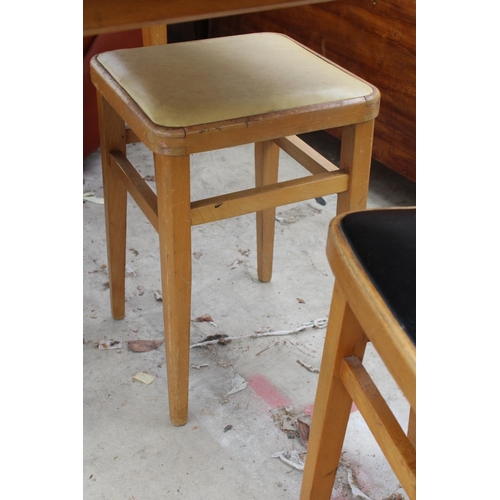 2604 - A 1950'S FORMICA TOP KITCHEN TABLE AND TWO CHAIRS