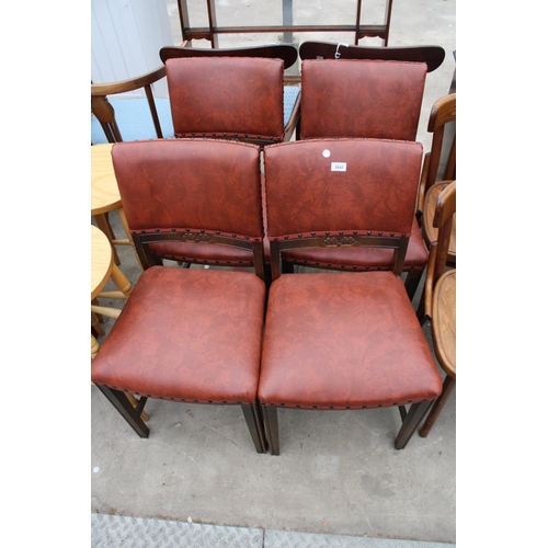 2643 - A SET OF FOUR OAK MID 20TH CENTURY DINING CHAIRS