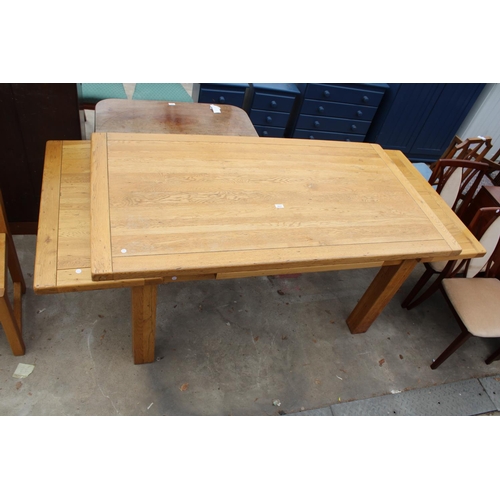 2647 - AN OAK DRAW-LEAF DINING TABLE ON SQUARE LEGS, 66