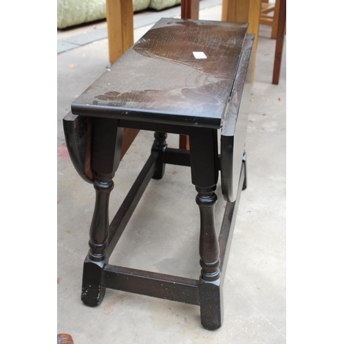 2672 - AN OAK MINIATURE DROP LEAF TABLE