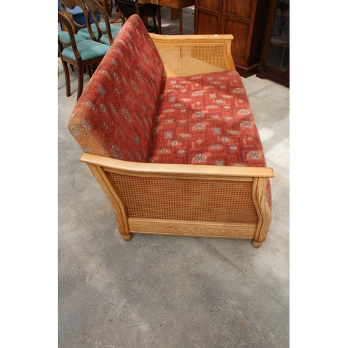 2729 - AN ERCOL ELM BERGERE SETTEE