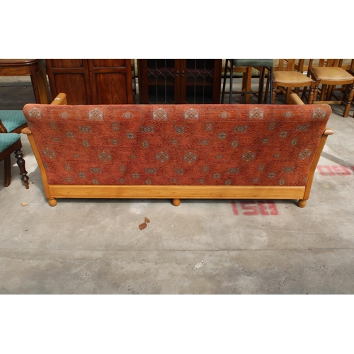 2729 - AN ERCOL ELM BERGERE SETTEE