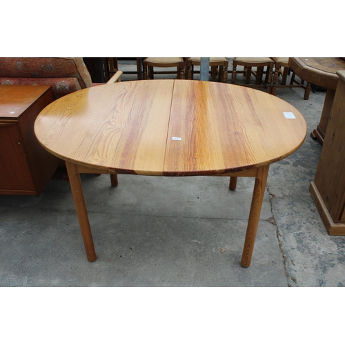 2749 - AN ERCOL BLUE LABEL OVAL PINE EXTENDING DINING TABLE, 54