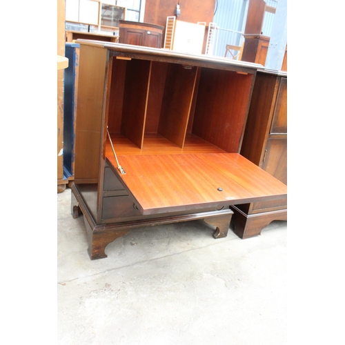 2752 - A MAHOGANY AND CROSSBANDED CABINET AND SIMILAR RECORD CABINET