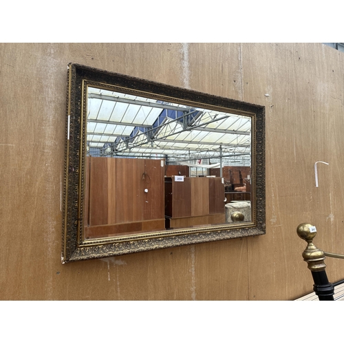 2856 - A GILT FRAMED BEVEL EDGE WALL MIRROR, 33