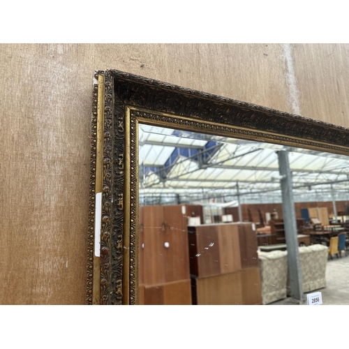 2856 - A GILT FRAMED BEVEL EDGE WALL MIRROR, 33