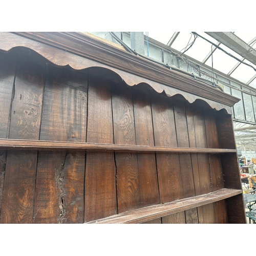 2861 - AN OAK GEORGE III DRESSER WITH THREE DRAWERS, POT BOARD AND PLATE RACK, 72