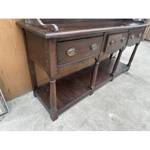 2861 - AN OAK GEORGE III DRESSER WITH THREE DRAWERS, POT BOARD AND PLATE RACK, 72