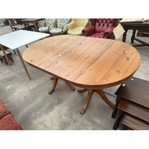 2882 - A PINE TWIN PEDESTAL DINING TABLE, 64