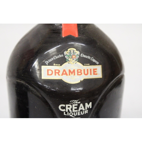 332 - A 1 LITRE BOTTLE OF PRINCE CHARLES EDWARDS DRAMBUIE CREAM LIQUEUR TOGETHER WITH A 70 CL BOTTLE OF TE... 