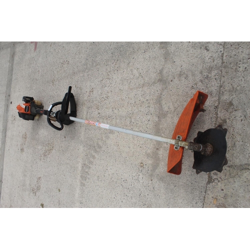 23 - HITACHI PETROL BRUSH CUTTER AND METAL BLADE  NO VAT