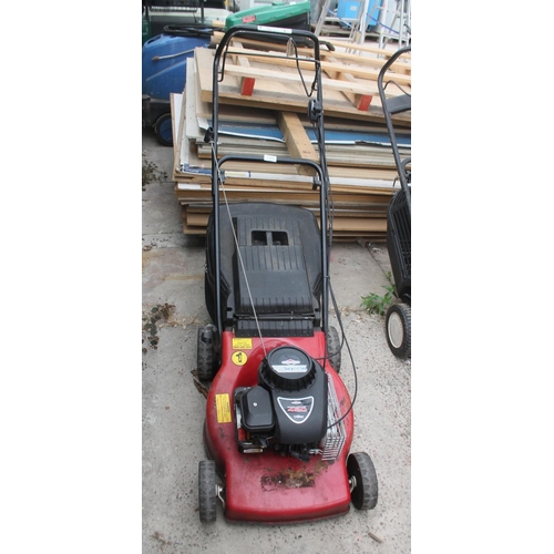 1309 - MOUNTFIELD PETROL S/P MOWER IN WORKING ORDER  NO VAT