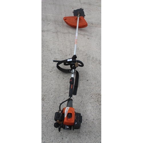 23 - HITACHI PETROL BRUSH CUTTER AND METAL BLADE  NO VAT