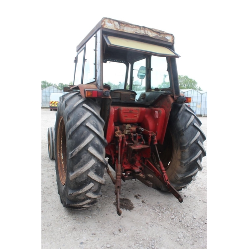 AN INTERNATIONAL 784 TRACTOR WITH 3360E LOADER PALLET FORKS GOOD BRAKES ...