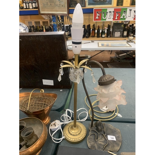 145 - A VINTAGE ART NOVEAU METAL GOOSE NECK LAMP WITH A WATER LILY BASE TOGETHER WITH A FURTHER BRASS LAMP