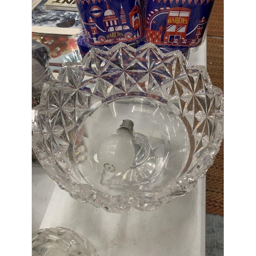 153 - A LARGE, HEAVY CUT GLASS PEDESTAL BOWL AND DECANTER, PLUS A VASE WITH SILVER PLATED BASE