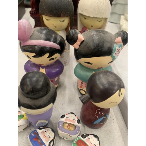 187 - A COLLECTION OF SIX KOKESHI DOLLS PLUS FIVE SMALL ONES