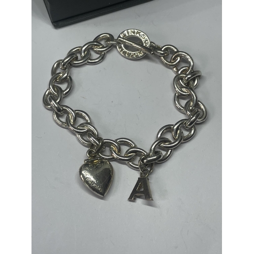 504 - A LINKS OF LONDON SILVER BRACELET WITH A HEART CHARM AND A CHARM IN A PRESENTATION BOX