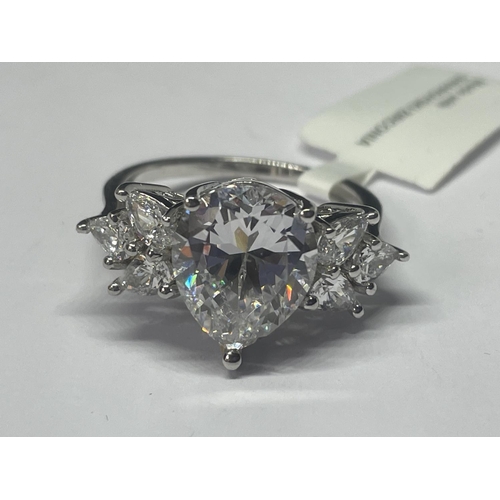 516 - A MARKED 925 SILVER RING WITH SWAROVSKI ZIRCONIAS SIZE R/S IN A PRESENTATION BOX