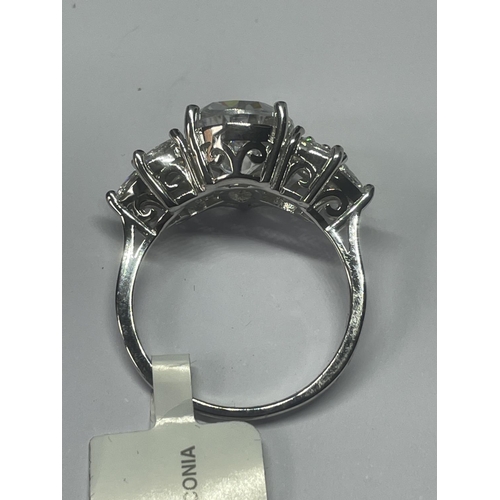 516 - A MARKED 925 SILVER RING WITH SWAROVSKI ZIRCONIAS SIZE R/S IN A PRESENTATION BOX