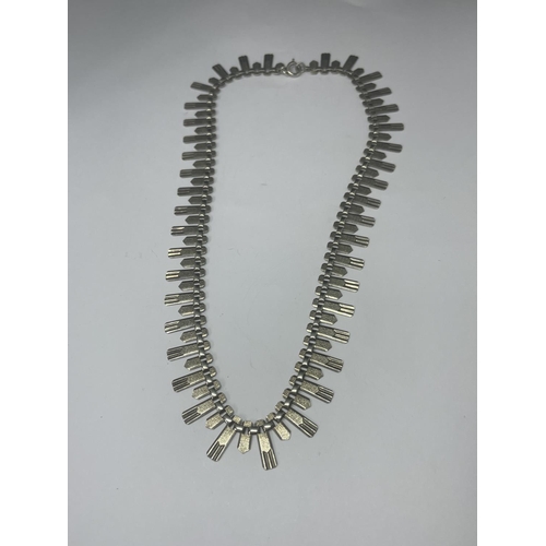 518 - A MARKED STERLING SILVER CLEOPATRA STYLE NECKLACE