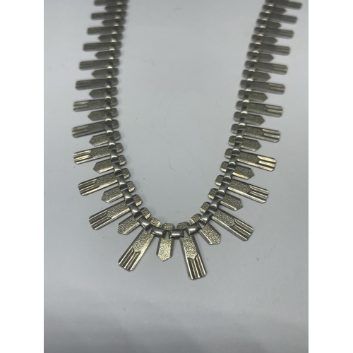 518 - A MARKED STERLING SILVER CLEOPATRA STYLE NECKLACE