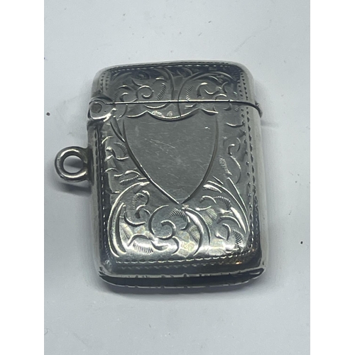 522 - A DECORATIVE HALLMARKED BIRMINGHAM SILVER VESTA CASE