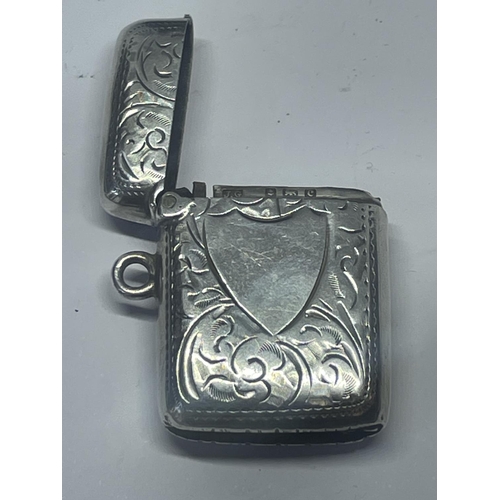 522 - A DECORATIVE HALLMARKED BIRMINGHAM SILVER VESTA CASE